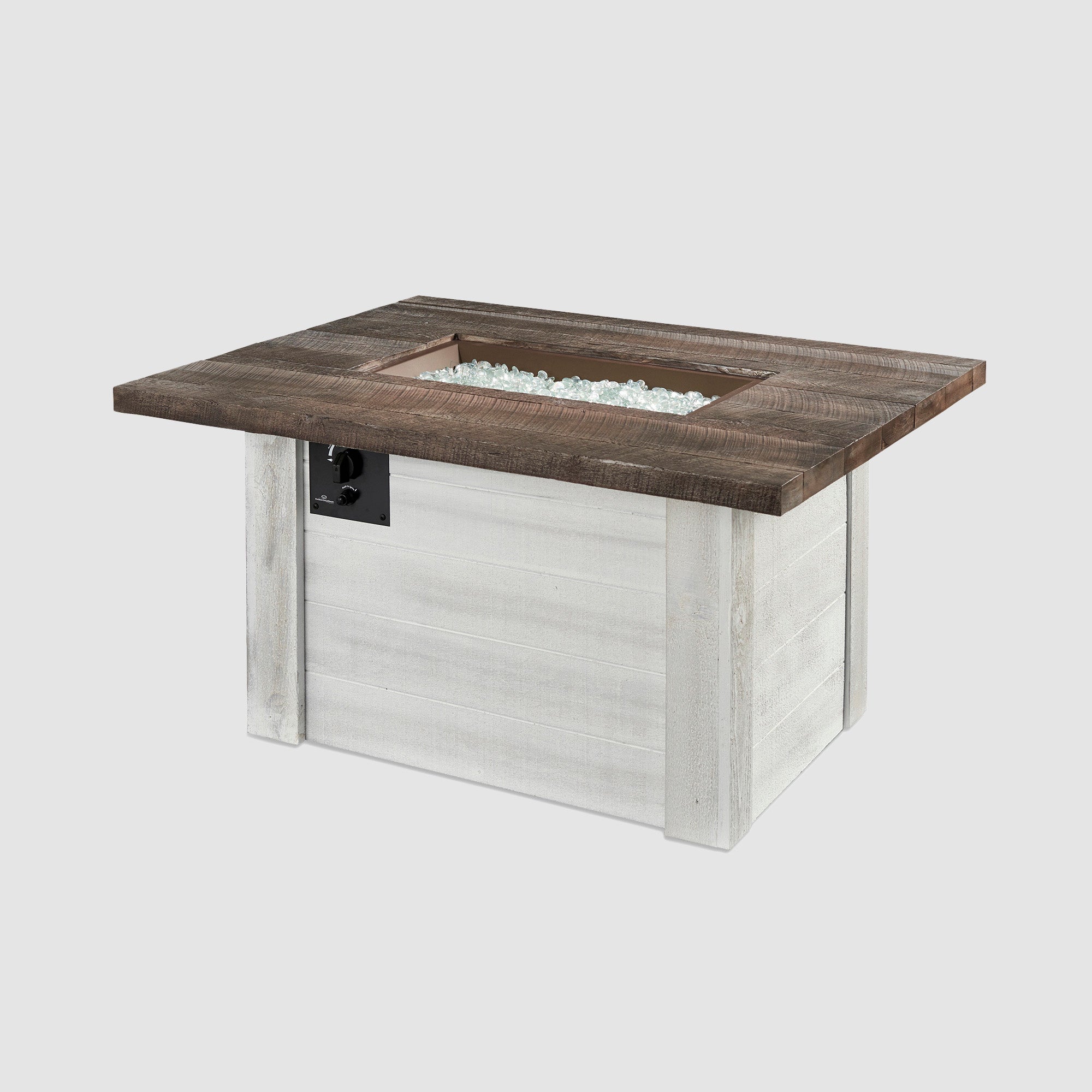 Alcott Rectangular Gas Fire Pit Table with fire media placed in the burner on a grey background