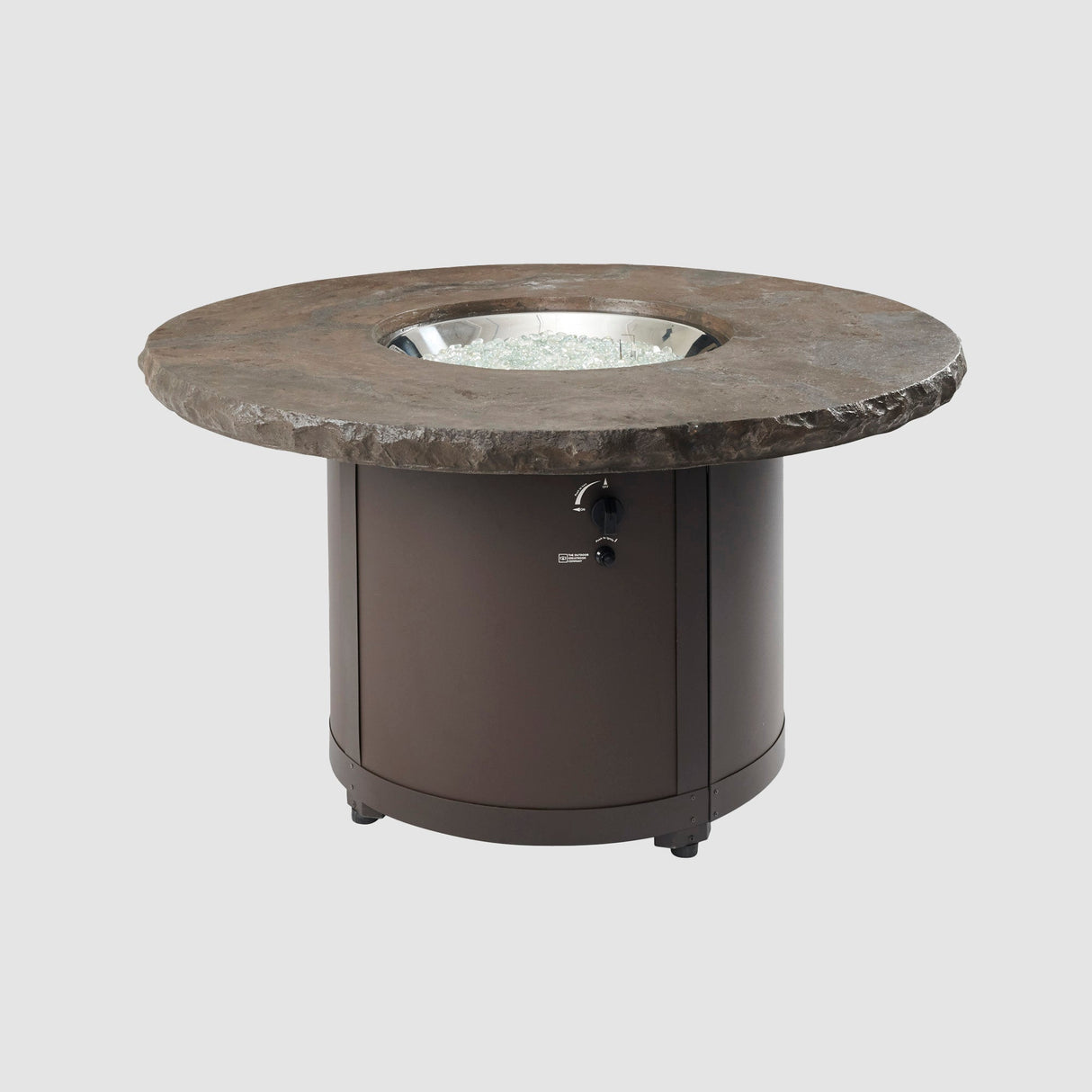 The Marbleized Noche Beacon Round Gas Fire Pit Table with its burner exposed on a grey background