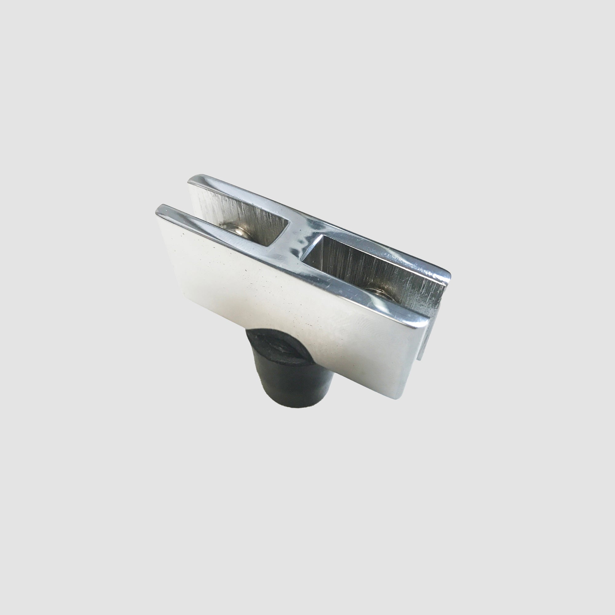 The bottom 180 Degree Connector for Glass Wind Guards and its silicon foot on a grey background