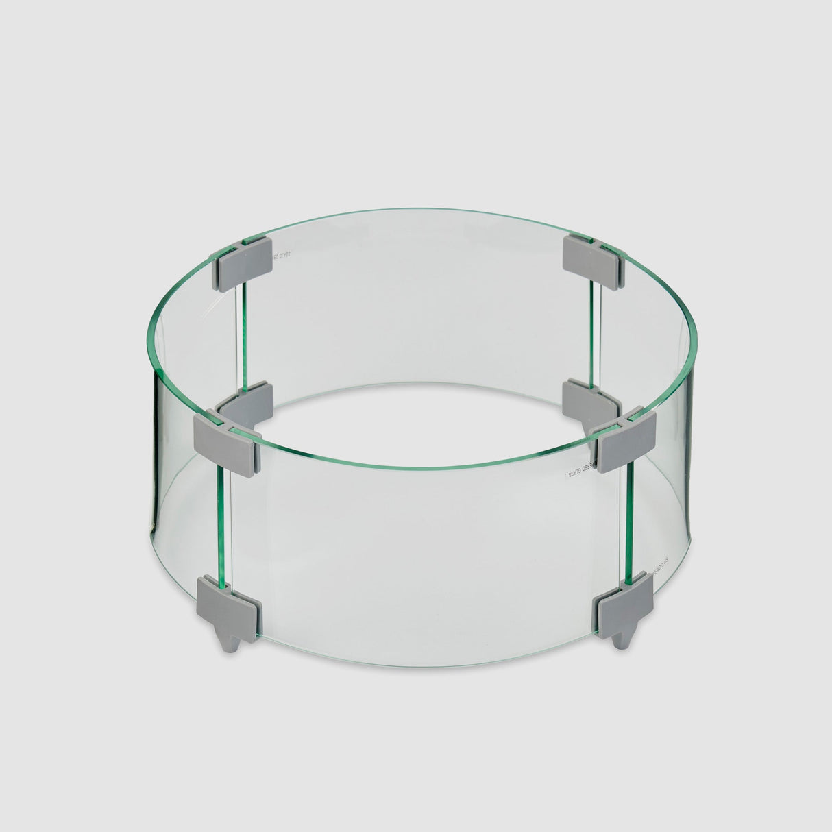 A 12" Round Glass Wind Guard set up on a white background
