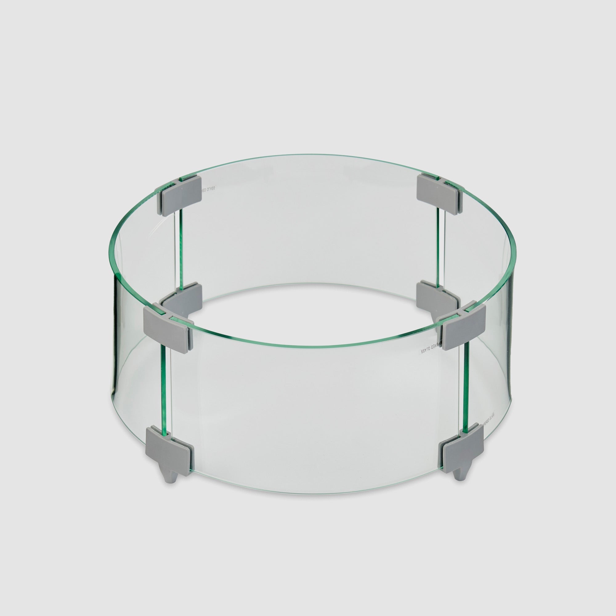A 12" Round Glass Wind Guard set up on a white background