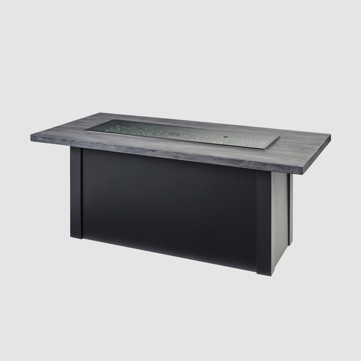 A cover placed on the burner of a Havenwood Linear Gas Fire Pit Table with a Carbon Grey top and Luverne Black base