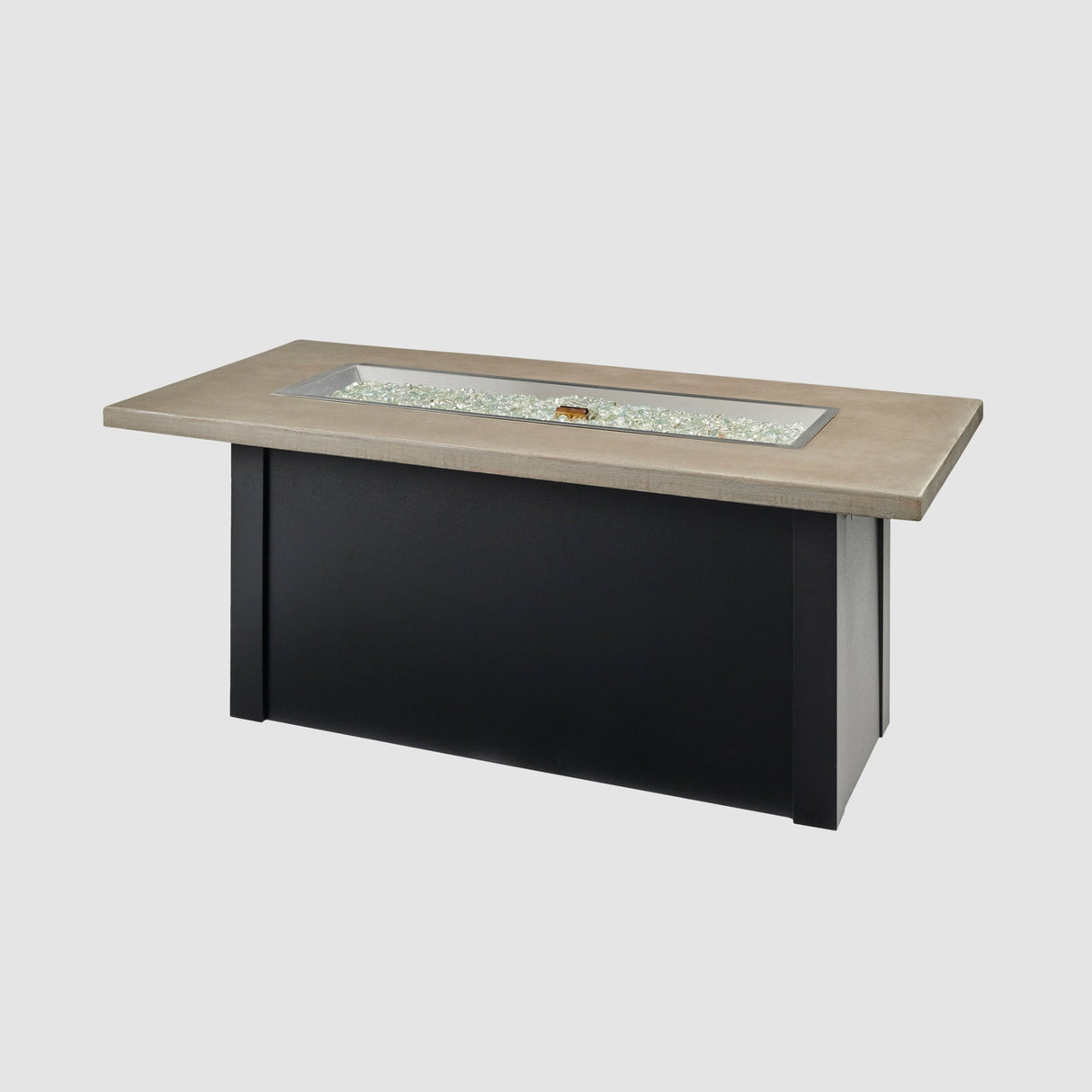 Fire gems placed in the burner of a Havenwood Linear Gas Fire Pit Table with a Pebble Grey top and Luverne Black base
