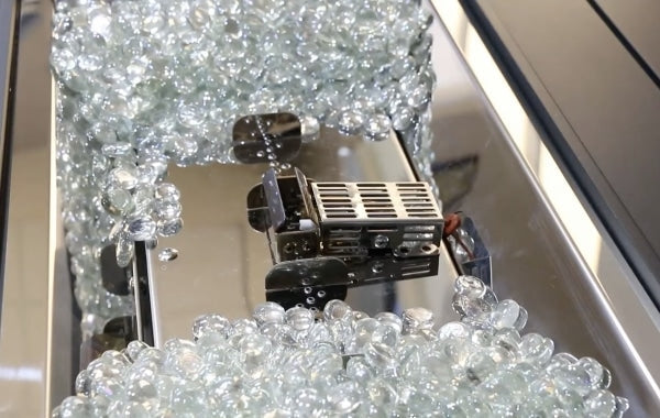 A linear Crystal Fire burner with fire gems near the burner