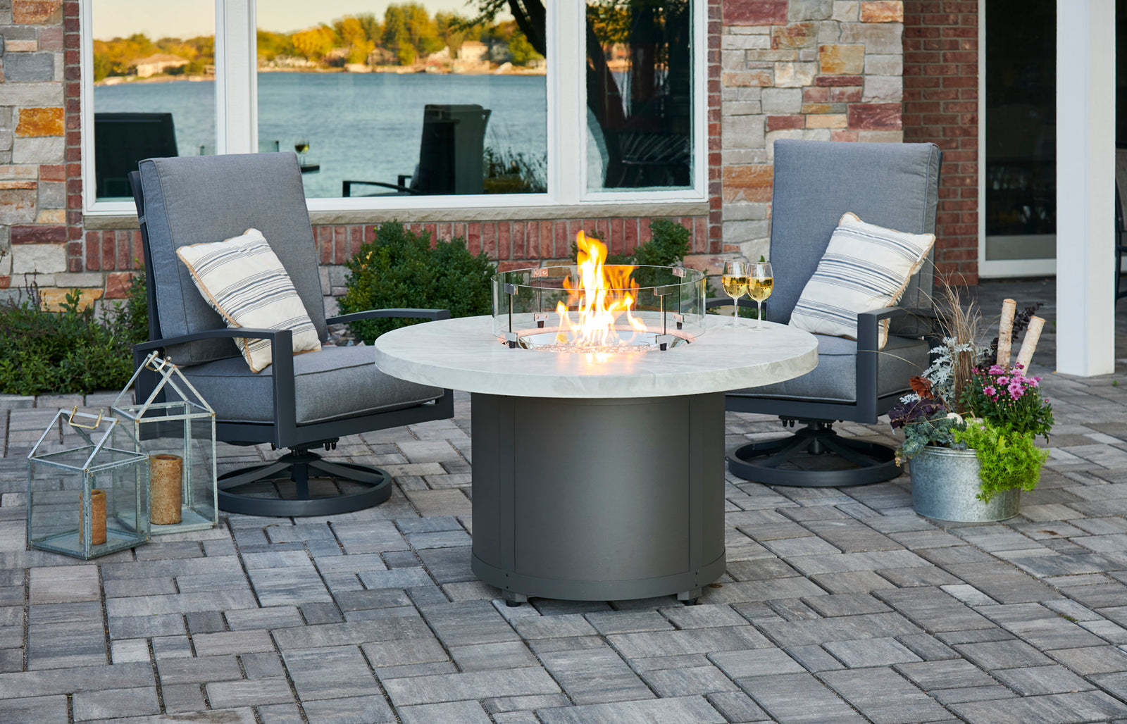 A Beacon Round Gas Fire Pit table from The Outdoor GreatRoom Company.