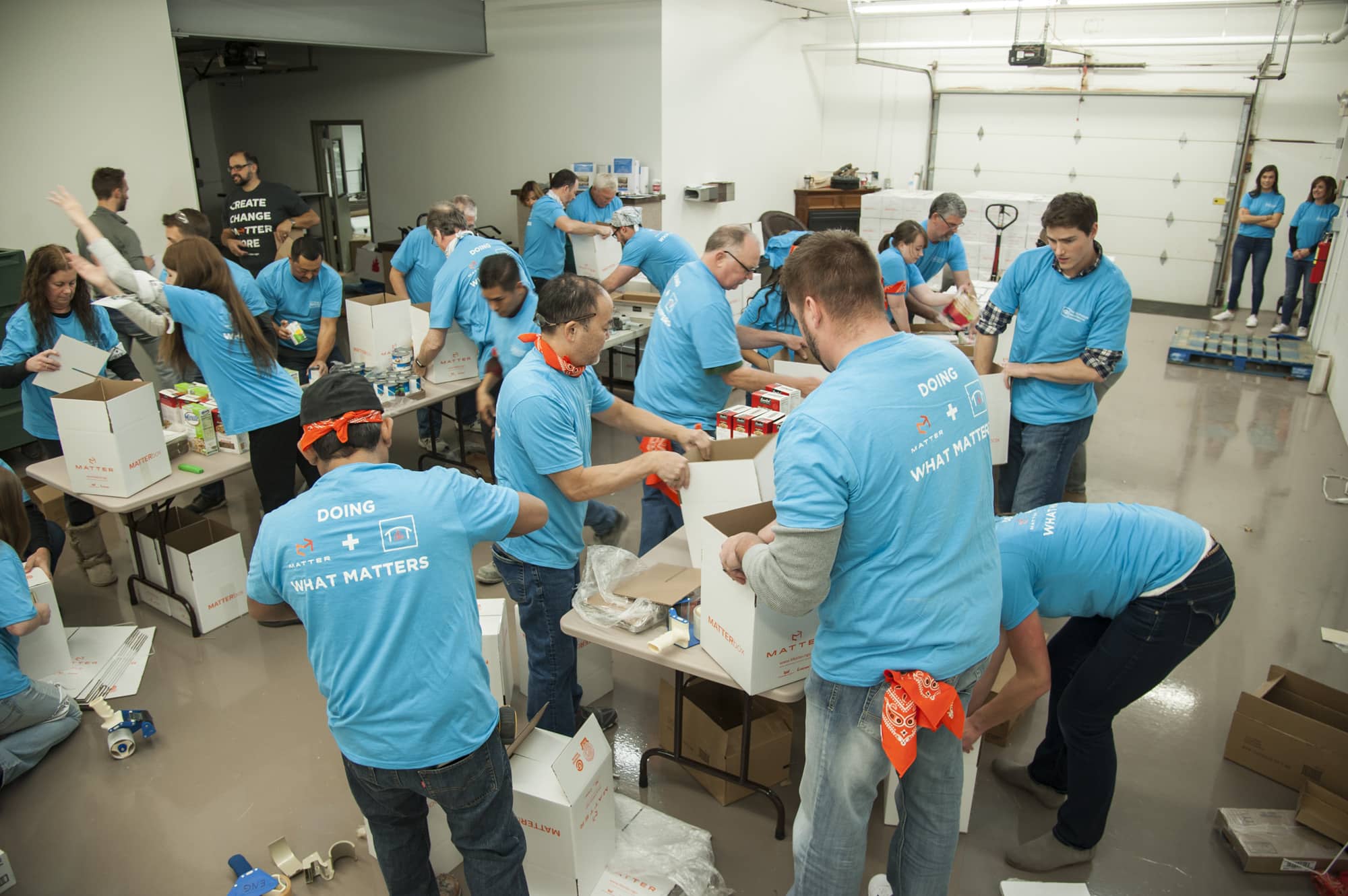 Outdoor GreatRoom Company Packs Meals for 640 People in Fun Corporate Volunteer Event