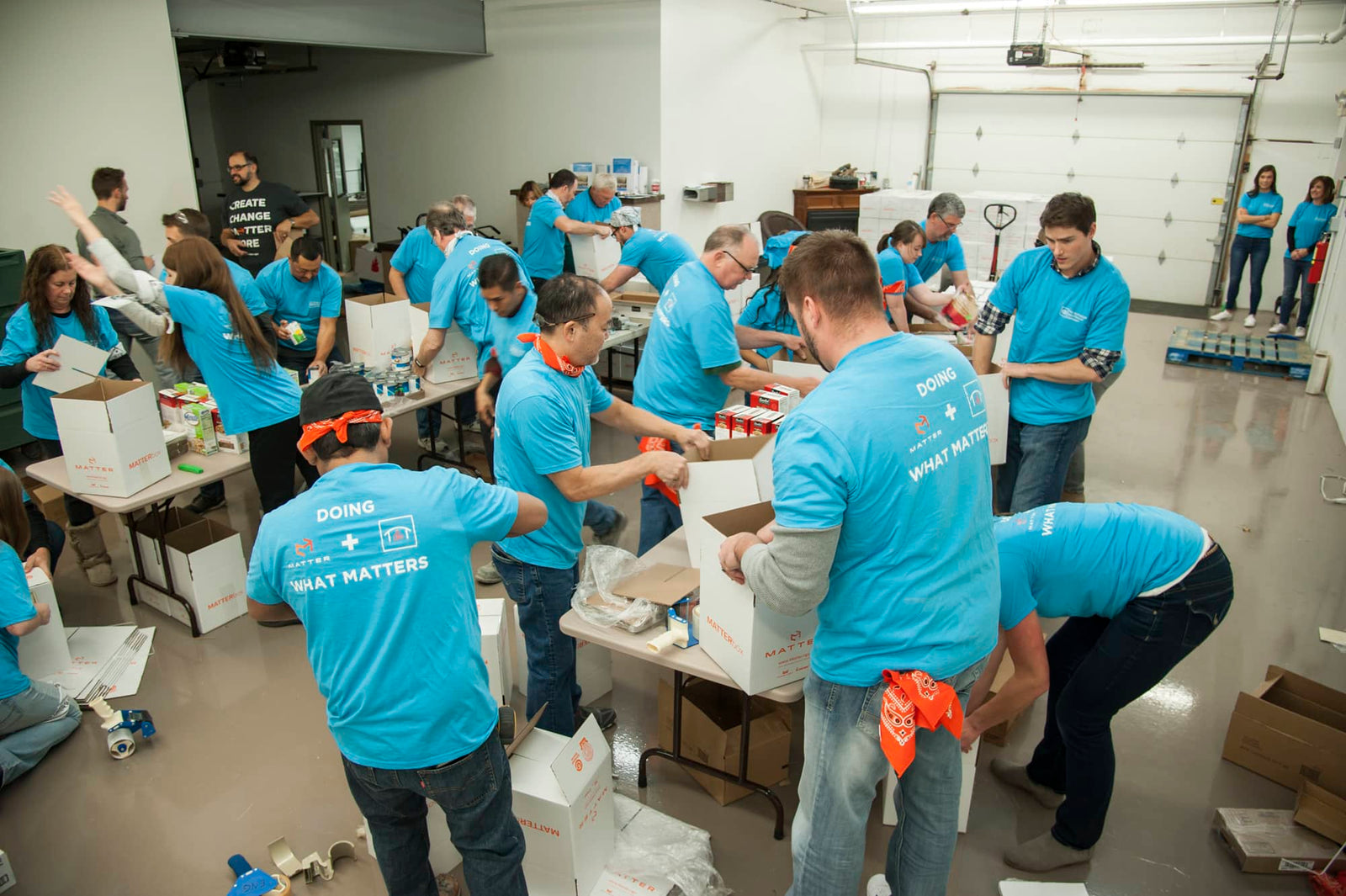 Outdoor GreatRoom Company Packs Meals for 640 People in Fun Corporate Volunteer Event