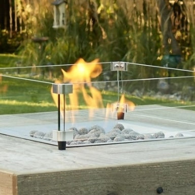 A close up view of a square glass wind guard