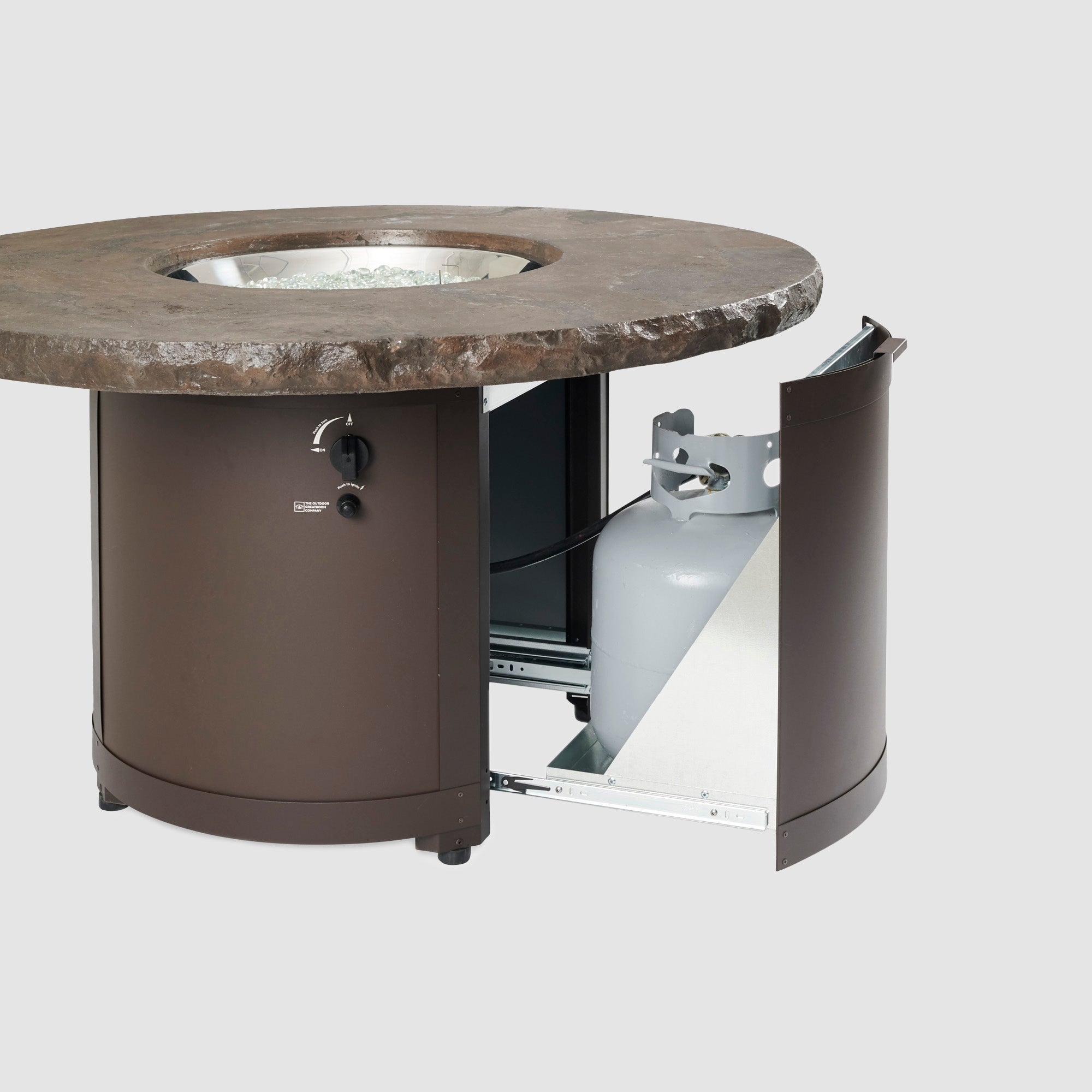 The side access door of the Marbleized Noche Beacon Round Gas Fire Pit Table on a grey background