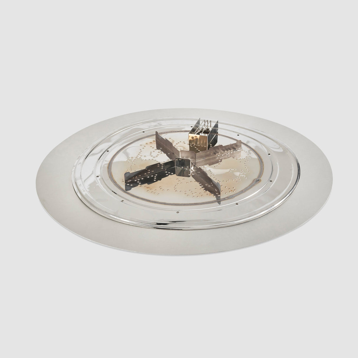 The 36" Crystal Fire Plus Round Gas Burner Insert and Plate Kit with a Direct Spark Ignition on a grey background