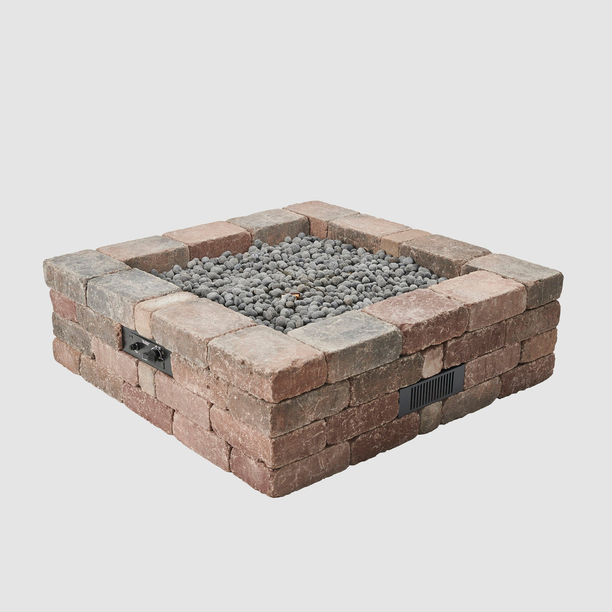 Bronson Block Square Gas Fire Pit Kit with lava rocks on the burner