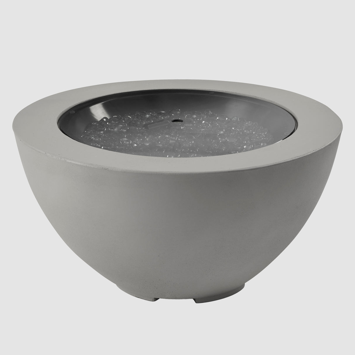 A cover placed on the burner of a Cove Round Gas Fire Pit Bowl 29" on a grey background