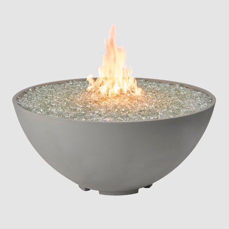 A Cove Edge Round Gas Fire Pit Bowl 42" with Flame on a grey background