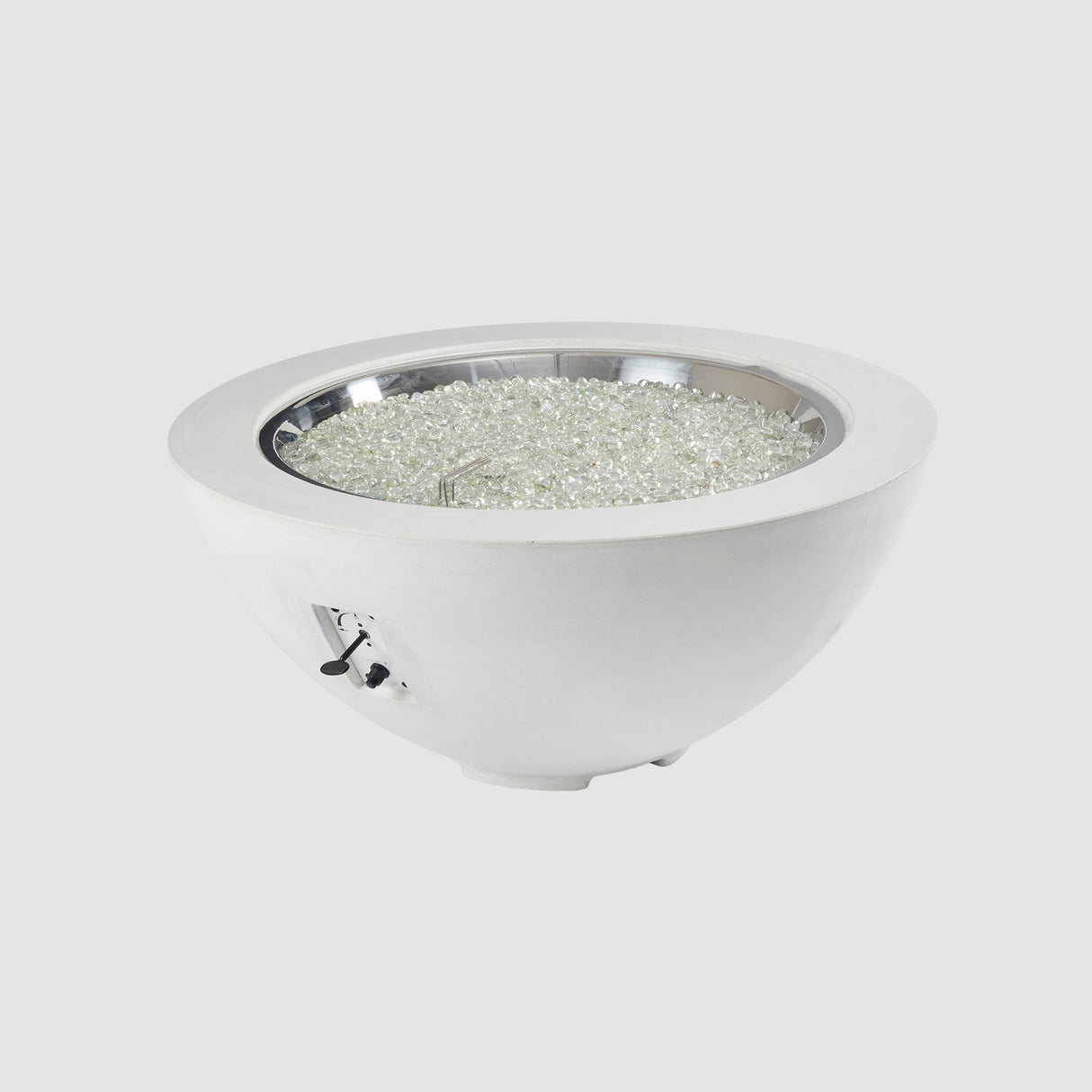 Fire gems on the burner of a White Cove Round Gas Fire Pit Bowl 42" on a grey background
