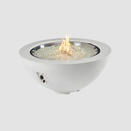 A White Cove Round Gas Fire Pit Bowl 42" with Flame on a grey background