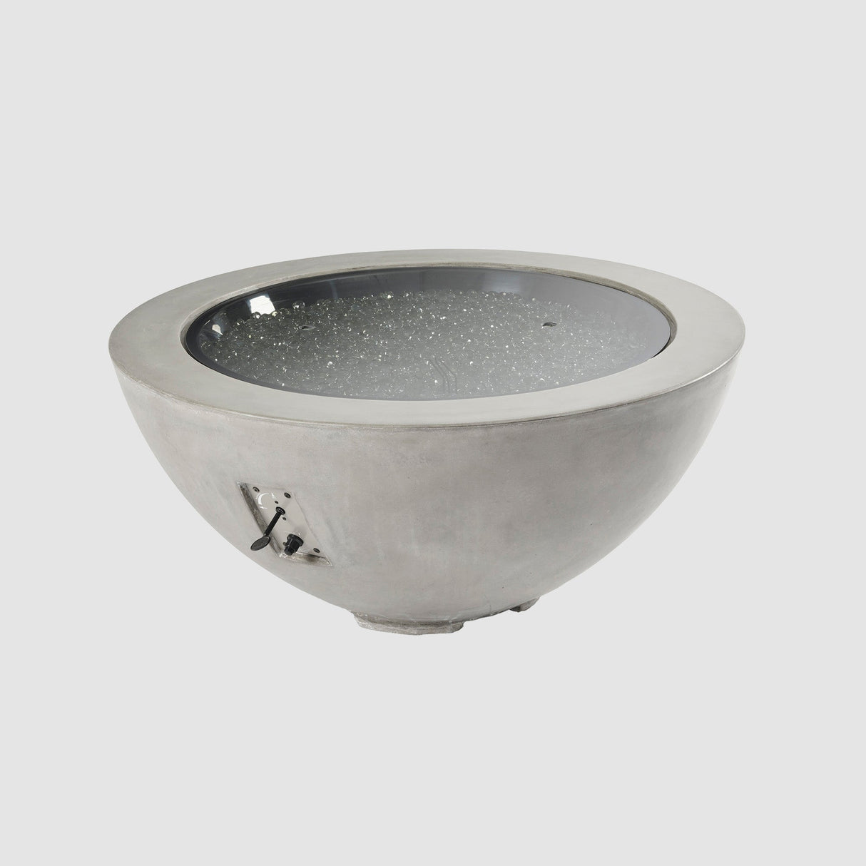 A cover placed on the burner of a Natural Grey Cove Round Gas Fire Pit Bowl 42"
