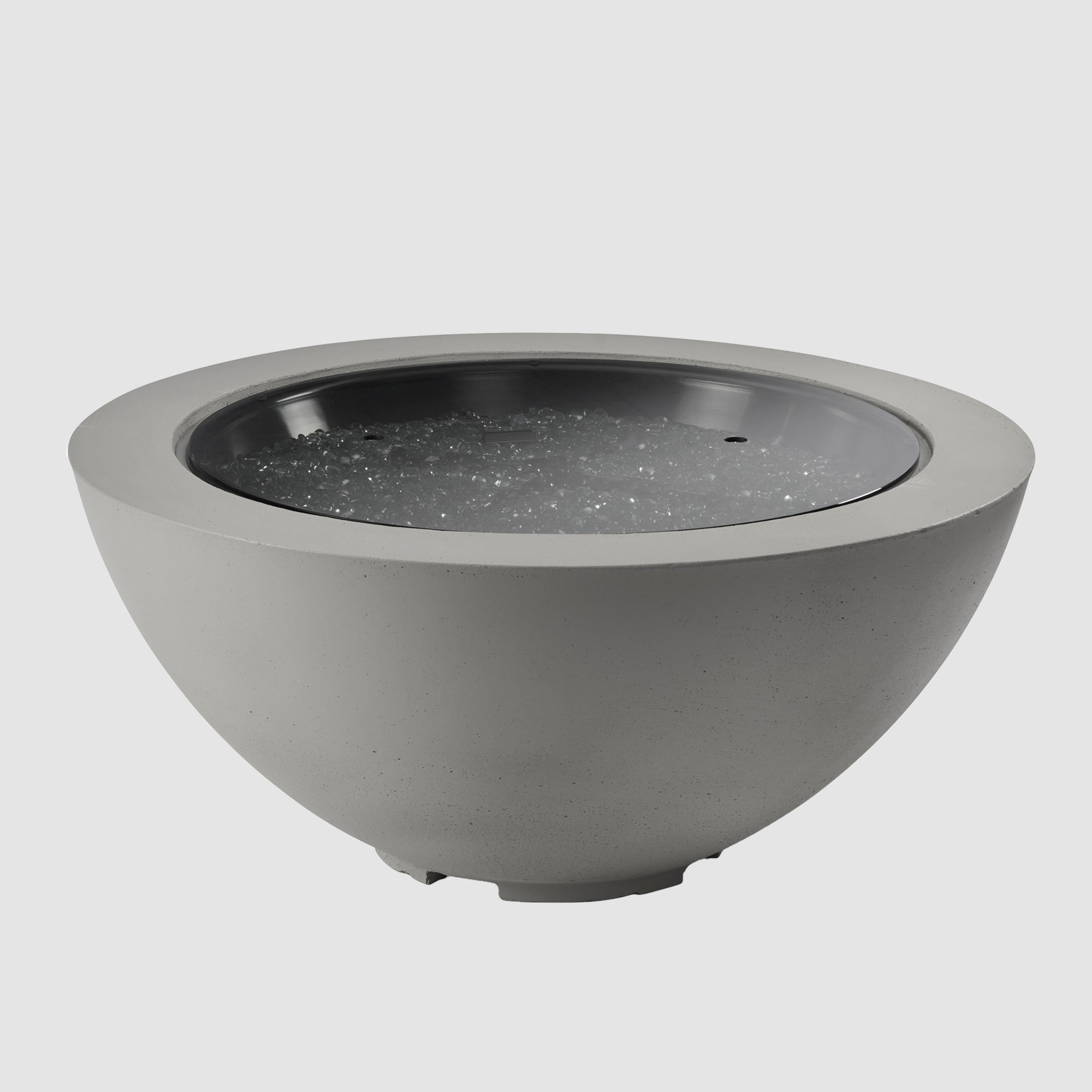 A cover placed on the burner of a Cove Round Gas Fire Pit Bowl 42" on a grey background