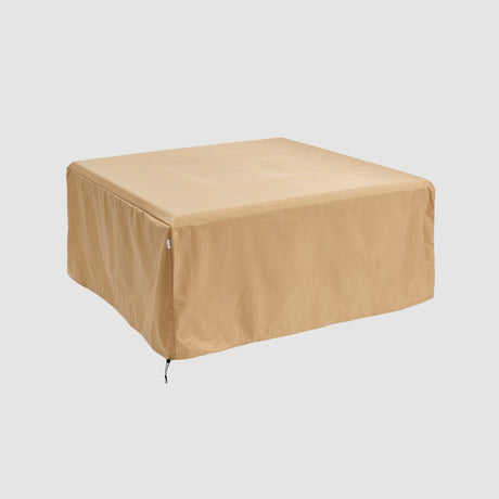 The Sierra Square Fire Table Protective Cover on a grey background