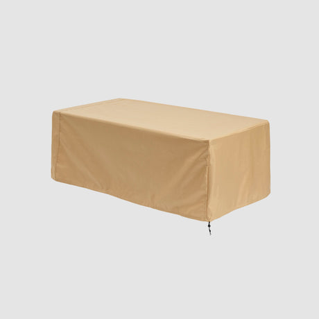 The Key Largo Fire Table Protective Cover on a grey background