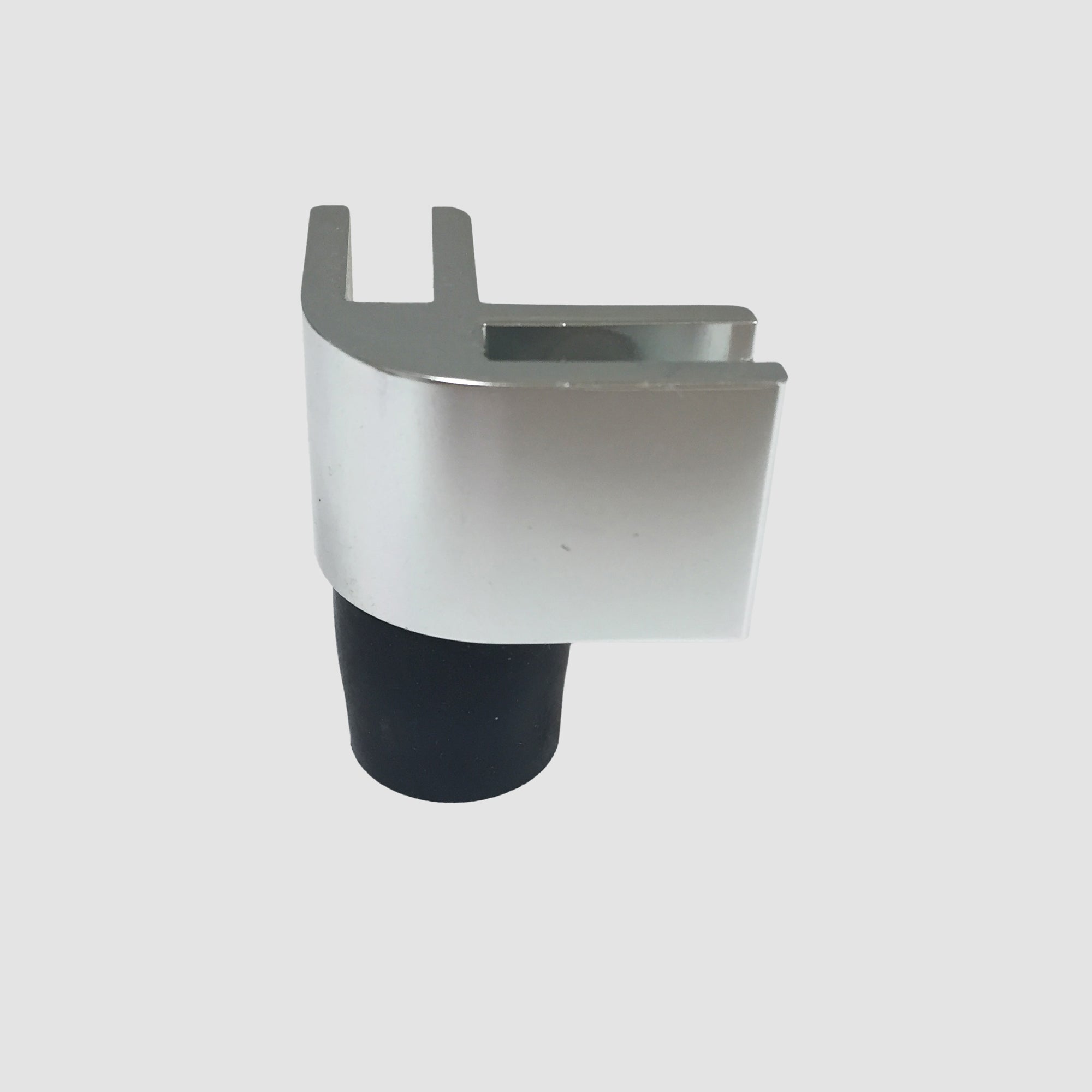 The bottom 90 Degree Connector for Glass Wind Guards and its silicon foot on a grey background