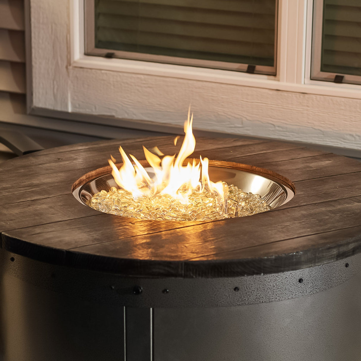 A close up of the flame coming from the Edison Round Gas Fire Pit Table