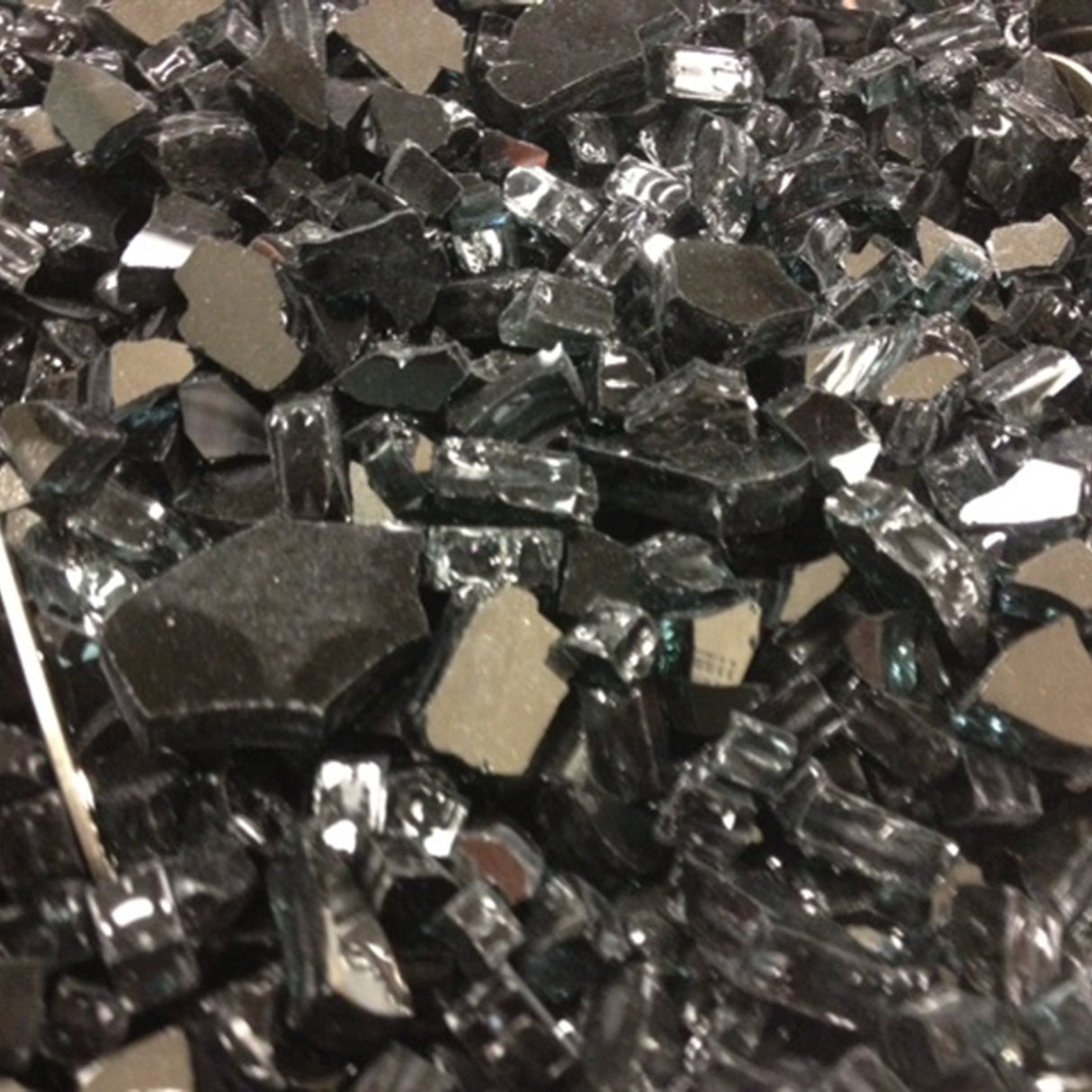 Close up of Black Crushed Tempered Fire Glass that is used in Crystal Fire Plus burners