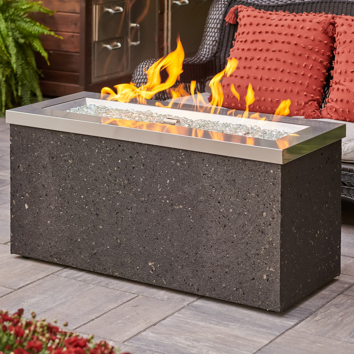 Close up of the flame coming from the burner of the Stainless Steel Key Largo Linear Gas Fire Pit Table