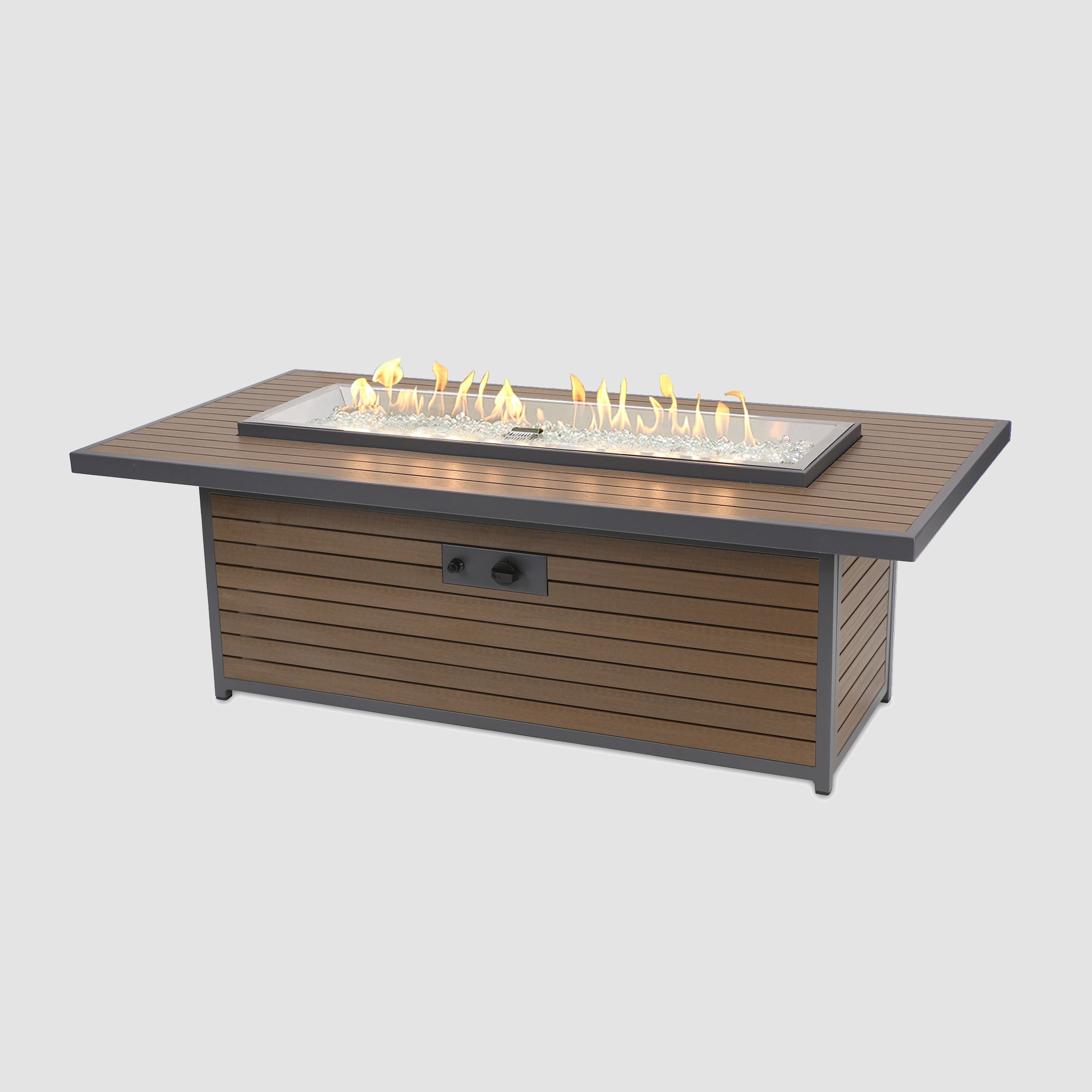 The Kenwood Linear Gas Fire Pit Table with flame on a grey background