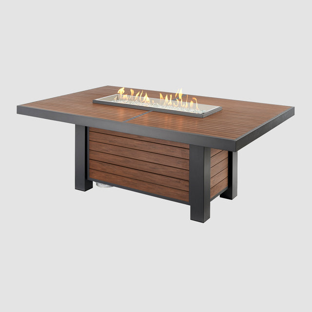 A  Kenwood Linear Dining Height Gas Fire Pit Table with flame