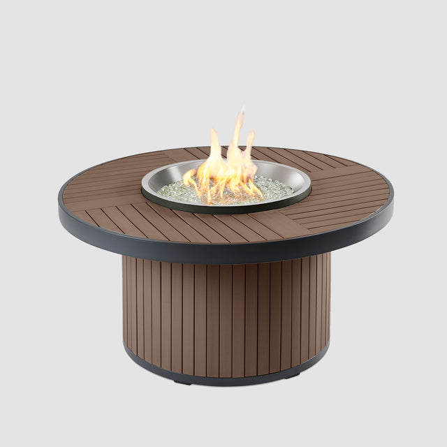 The Kenwood Round Gas Fire Pit Table with flame on a grey background