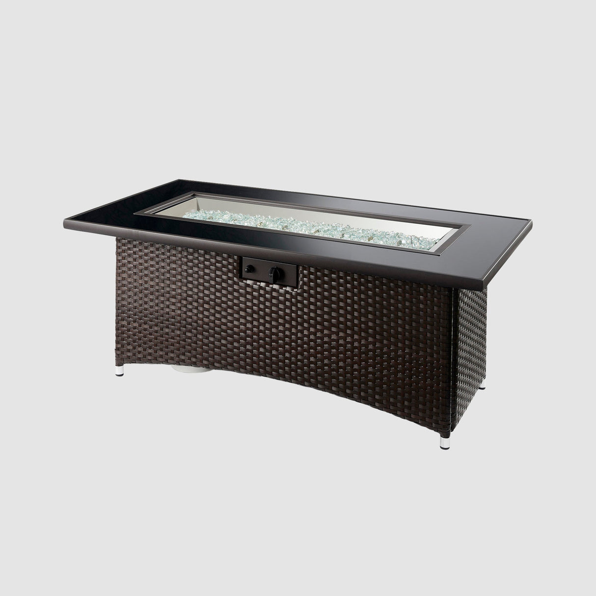 Fire gems on the burner of a Montego Linear Gas Fire Pit Table