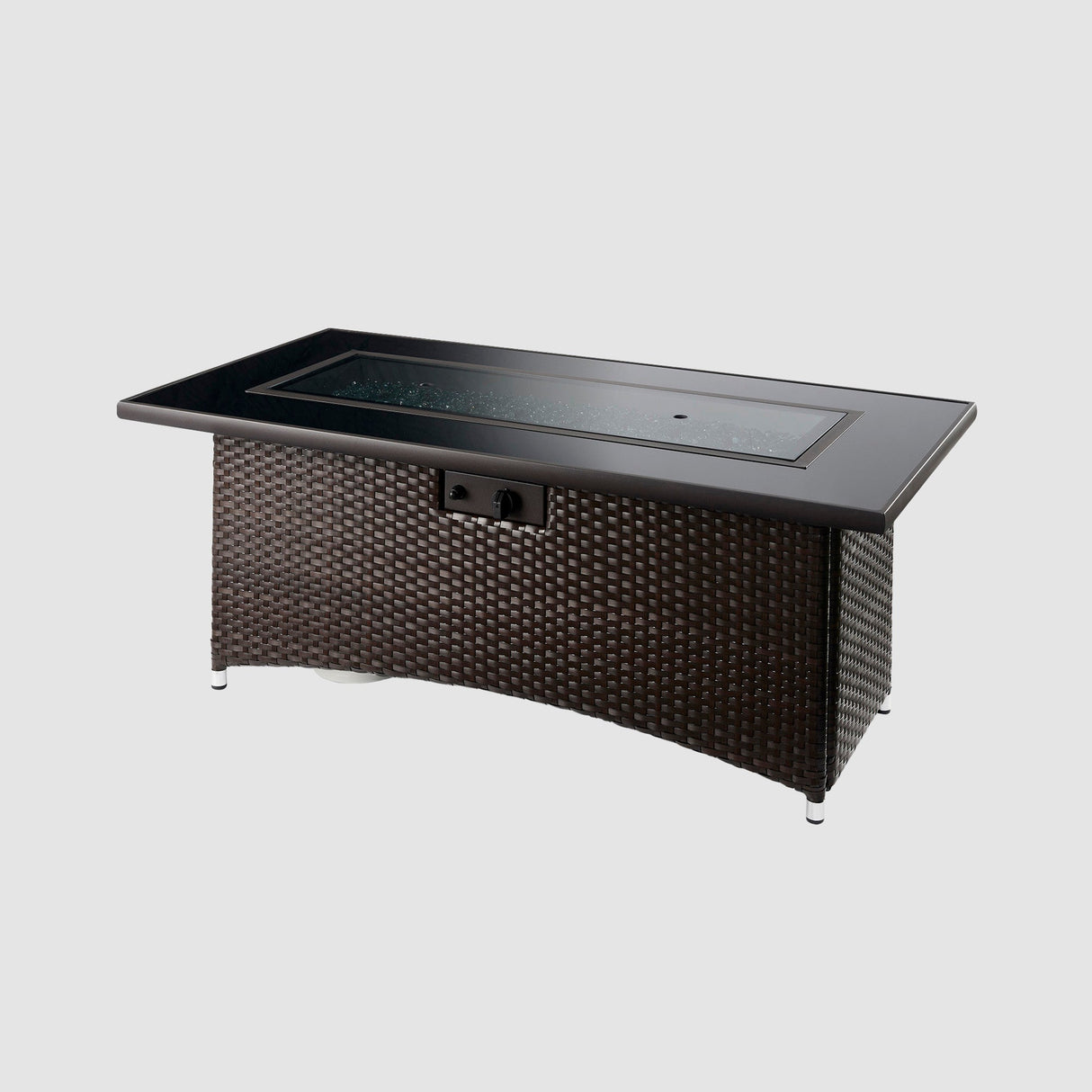 A cover placed on the burner of a Montego Linear Gas Fire Pit Table