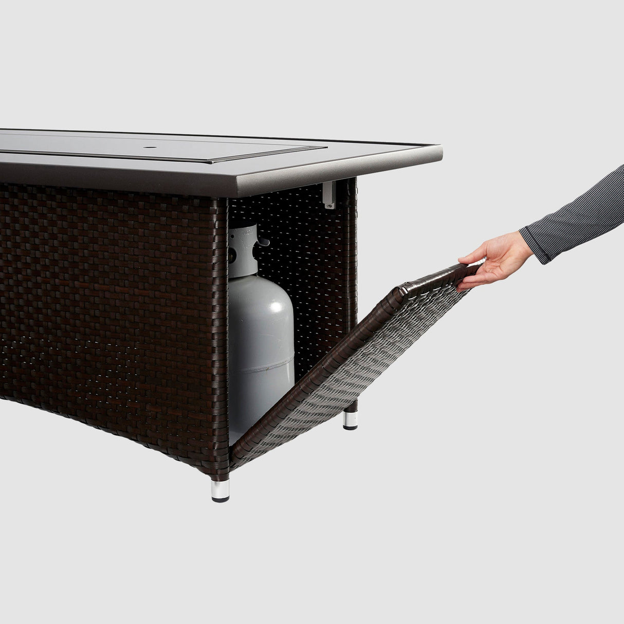 The side access door opening on a Montego Linear Gas Fire Pit Table
