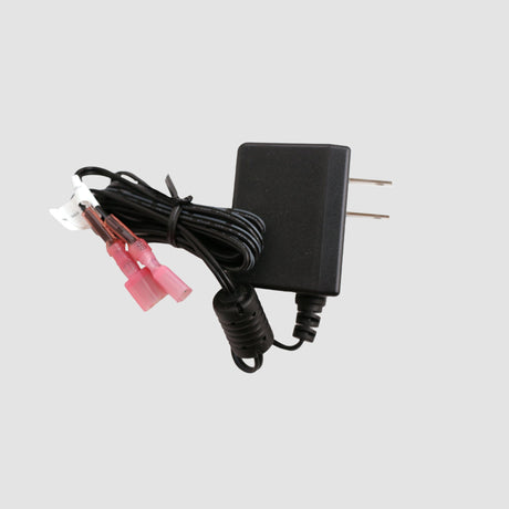 The Step Down Adapter - 110VAC/3VDC on a grey background