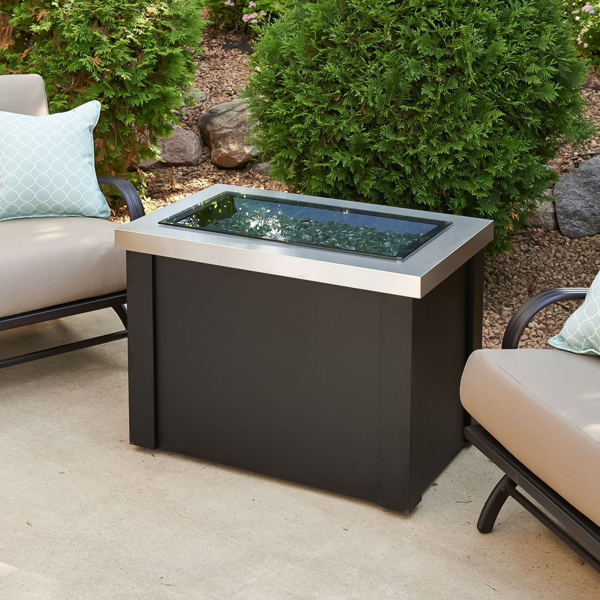 A cover placed on top of the Providence Rectangular Gas Fire Pit Table allowing it to be used as and outdoor table