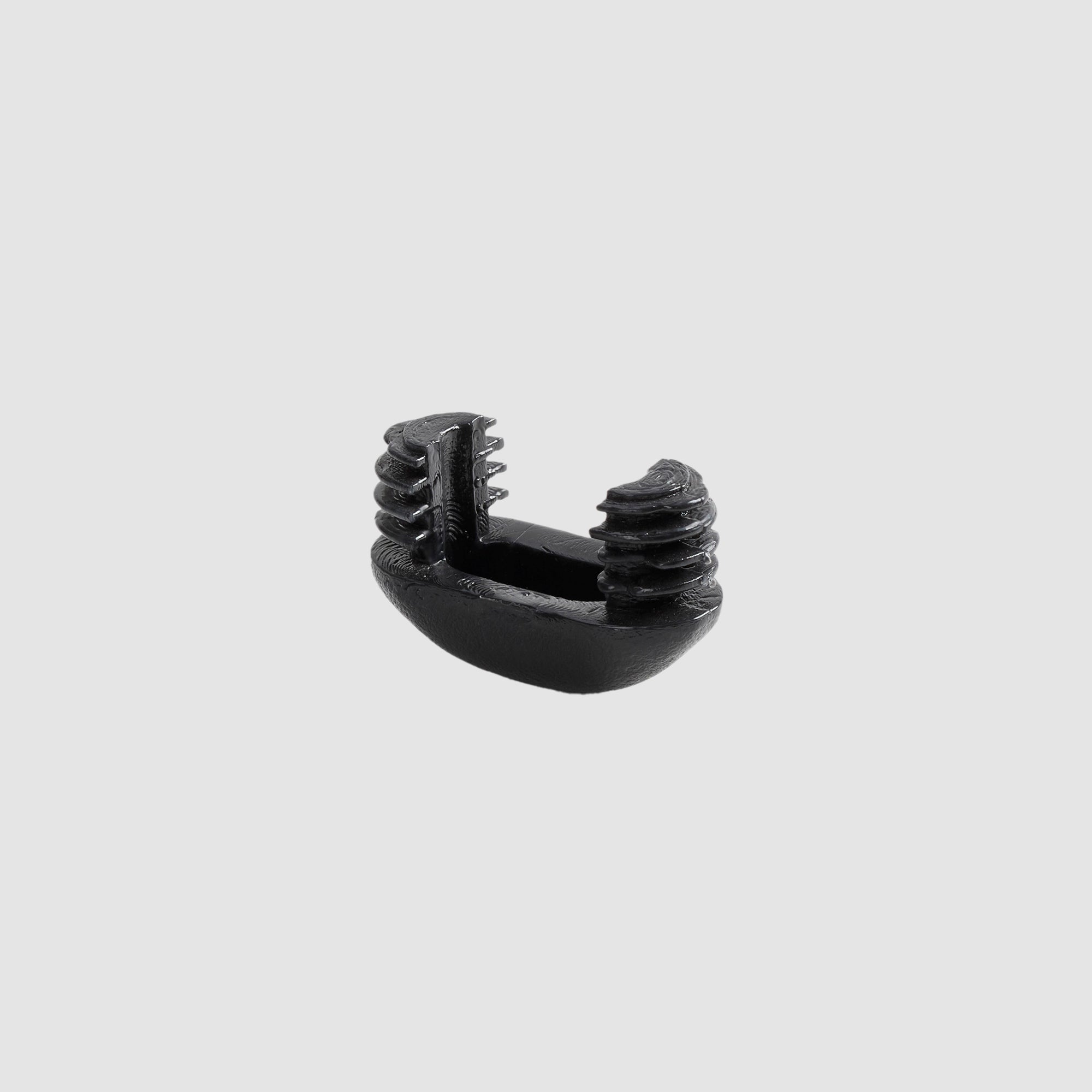 The Kenwood Chat Chair Replacement Foot on a grey background
