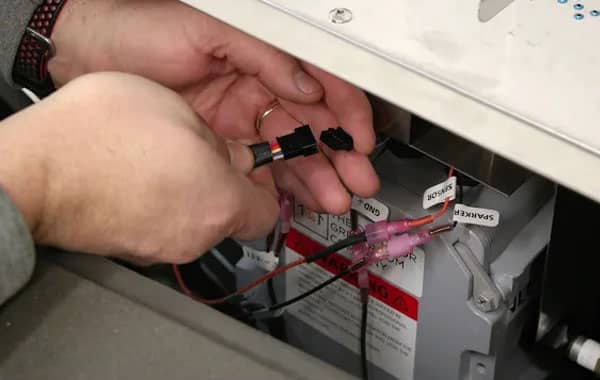 A thumbnail for a video that highlights how to set up the wiring on a Crystal Fire burner