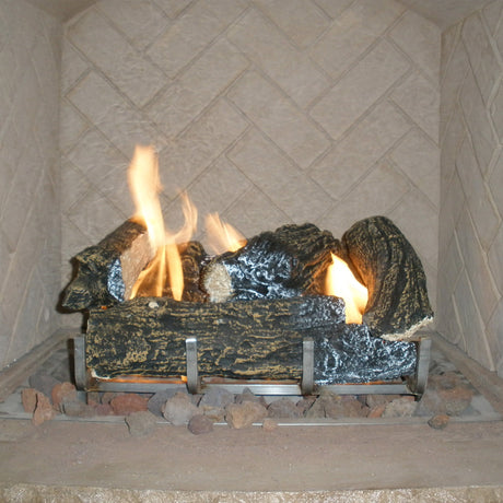 The Outdoor Ceramic Fiber Log Set with a Grate supporting a flame coming from the burner