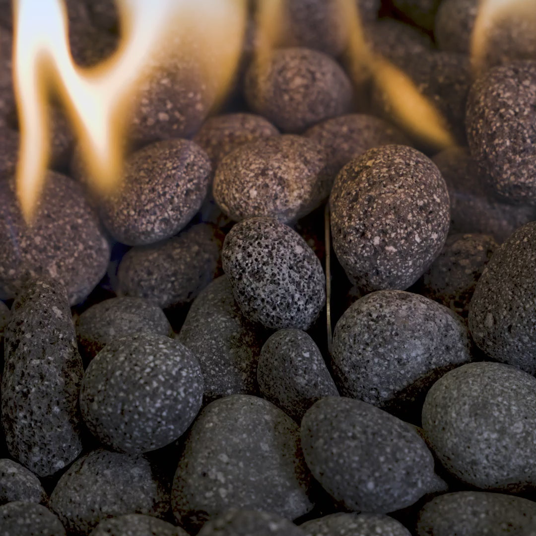 A video of a flame spreading through a bed of Tumbled Lava Rock