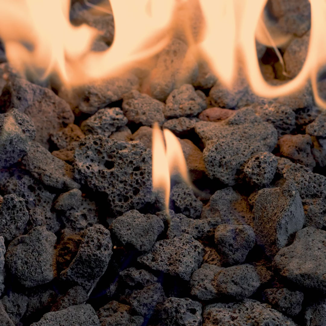 A video of a flame spreading through a bed of Black Lava Rock